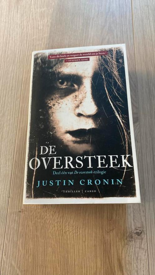 Justin Cronin - De oversteek, Boeken, Thrillers, Zo goed als nieuw, Ophalen of Verzenden