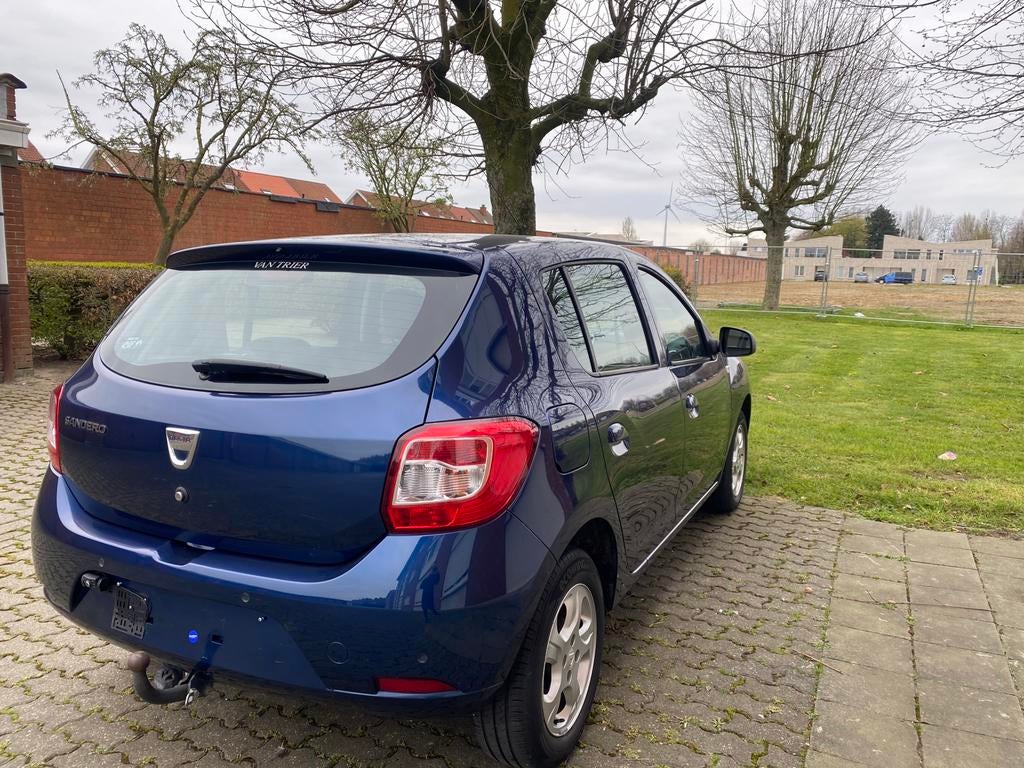 Dacia Sandero 1.2i 2016 58000km Clim, Auto's, Dacia, Blauw, Parkeersensor, Particulier, Sandero
