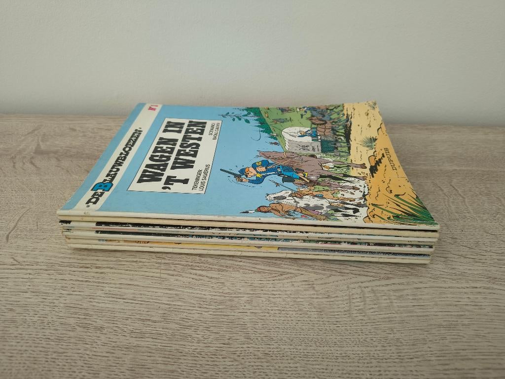 Strips De Blauwbloezen, Ophalen of Verzenden, Gelezen