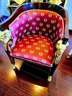 Uitzonderlijke zetel in hout en Brons, Ophalen