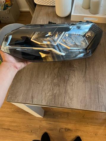 VW Polo koplamp links (origineel OEM 2G1 941 005) beschikbaar voor biedingen