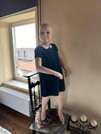 Etalagepop Kind, Ophalen