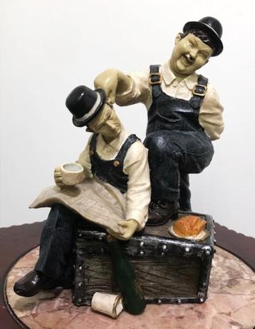 Beeld Laurel en Hardy als spaarpot beschikbaar voor biedingen