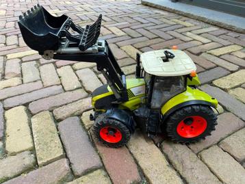 bruder traktor Claas 950 action met dakstuur en frontlader beschikbaar voor biedingen