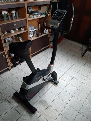 Vélo d'appartement (Christopeit AX 3000), Jambes, Comme neuf, Enlèvement, Vélo d'appartement