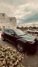 Toyota C-HR 12/2022, Auto's, Toyota, Automaat, 4 cilinders, Leder en Stof, Zwart