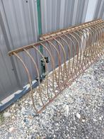 Anciens grands râteliers en fer, Enlèvement