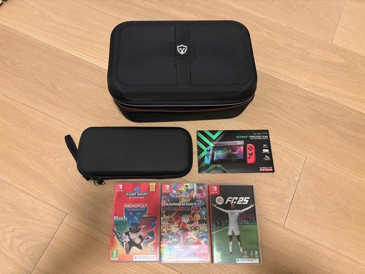 Nintendo Switch OLED Mario Red Edition + spelletjes, Consoles de jeu & Jeux vidéo, Consoles de jeu | Nintendo Switch, Comme neuf