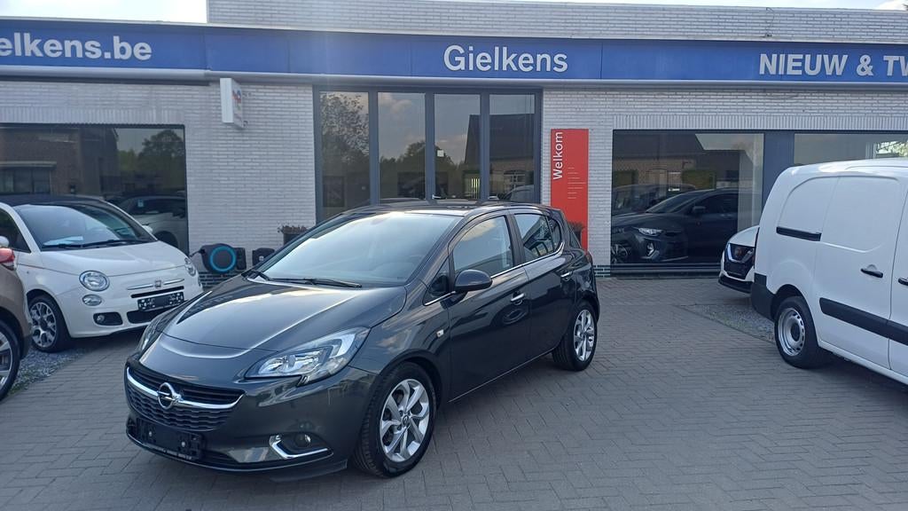Opel Corsa 1.4i cosmo *62000km.*1jaar garantie., Voorwielaandrijving, Gebruikt, 4 cilinders, Bedrijf