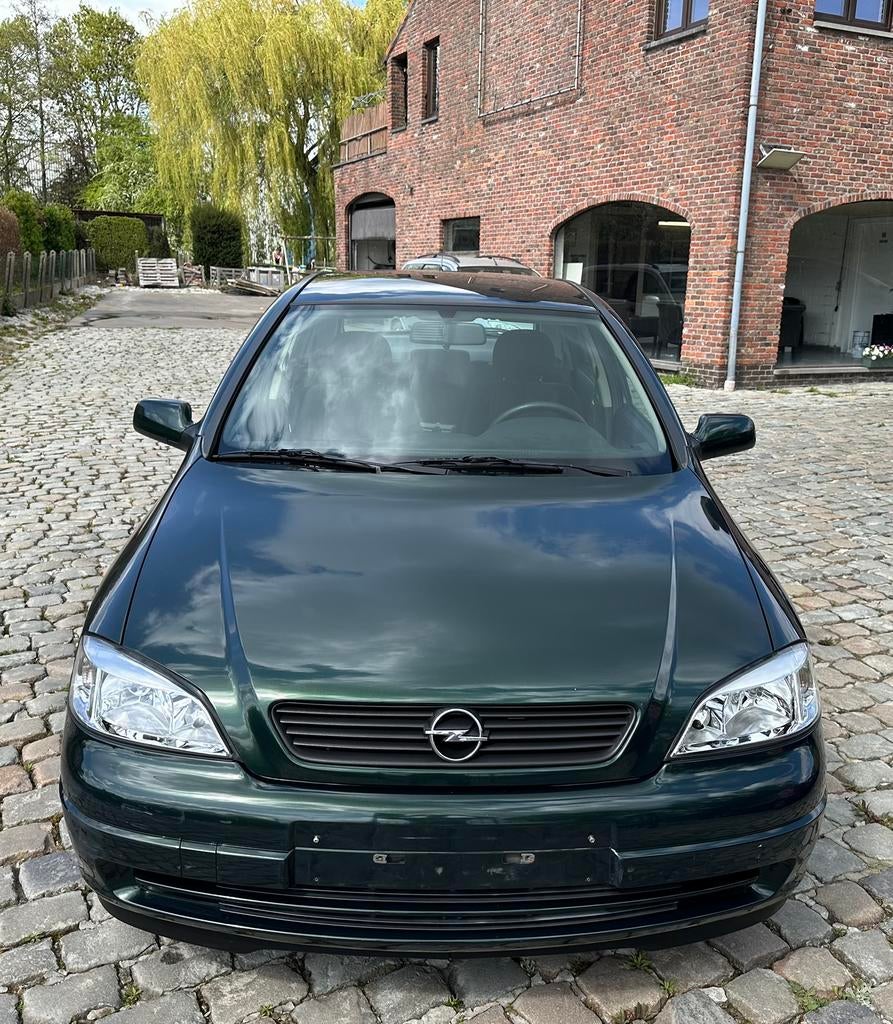 Opel astra benzine automaat weinig km gekeurd voor verkoop, Auto's, Zwart, 4 cilinders, 1389 cc, 5 deurs