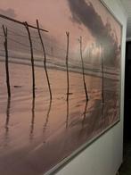 Grote fotokader, Ophalen