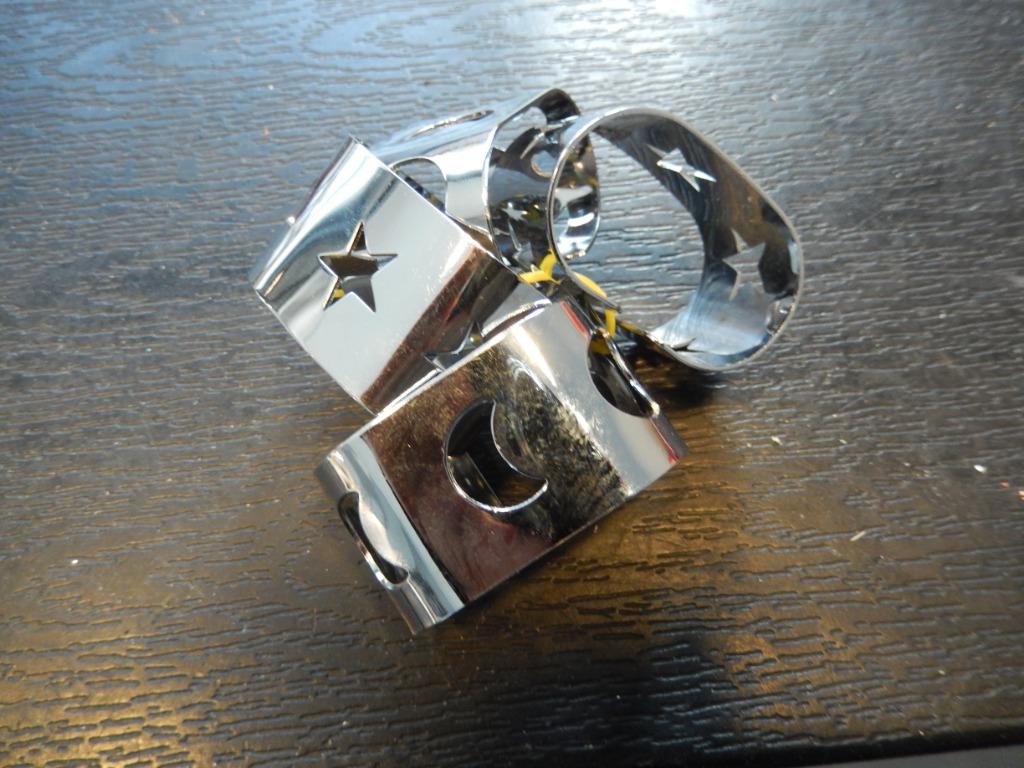 4 zilverkleurige servetringen (ster/maan), Ophalen, Gebruikt