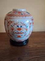 Amari porseleinen vaas, Ophalen