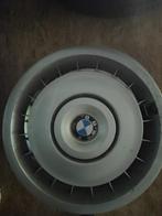 Wieldeksels BMW E34, Ophalen