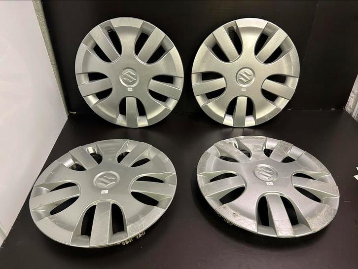 4 enjoliveurs Suzuki Swift splash 15", Autos : Divers, Enjoliveurs, Utilisé, Enlèvement ou Envoi