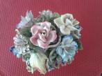 Breekbaar stenen beeld ('vaas met bloemen'), Ophalen