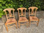 Houten stoelen met lier-rugleuning en rieten zitting, Ophalen