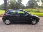 Peugeot 206 1100cc benzine MOD 2004 zwart ctok, Voorwielaandrijving, Stof, Zwart, 4 cilinders
