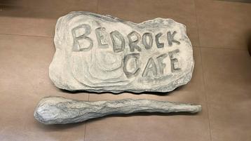 Knuppel/paneel Bedrock Café (Flintstones) beschikbaar voor biedingen