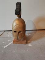 Houten spartaanse helm, Ophalen