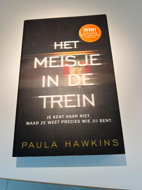 Boek – Paula Hawkins: Het Meisje in de Trein, Boeken, Thrillers, Zo goed als nieuw, Ophalen of Verzenden