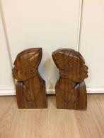 2 houten afrikaanse beelden, Enlèvement