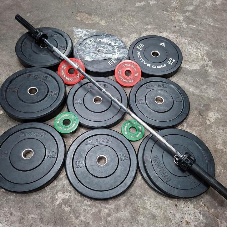 Olympische Bumper Plates Set + Technogym Olympische Barbell, Sport en Fitness, Fitnessmaterialen, Zo goed als nieuw, Ophalen