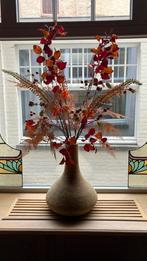 Vaas met boeket, Ophalen