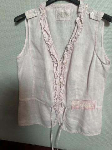 Licht roze top beschikbaar voor biedingen