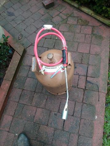 Gas brander met gasfles beschikbaar voor biedingen