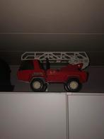 Vieux camion en tôle jouet pompiers