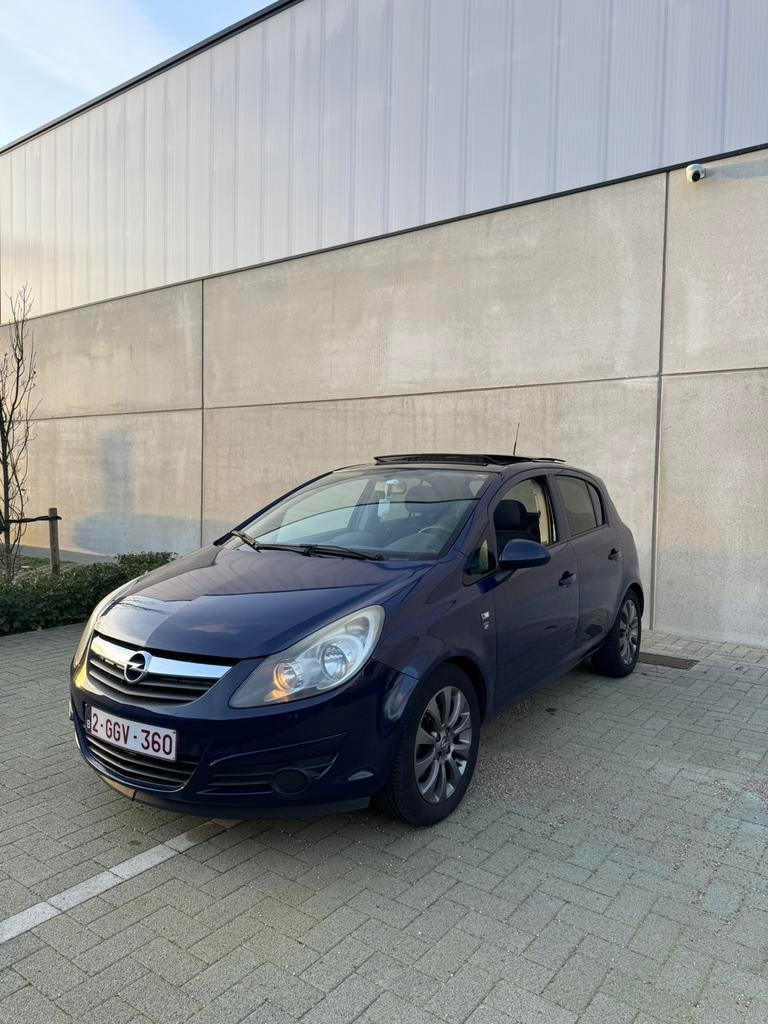 Opel Corsa 2010 1.4 benzine 111 Jahre Edition, Auto's, 4 cilinders, Blauw, Multifunctioneel stuurwiel, Handgeschakeld