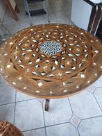 Table ronde marquetée, Ophalen