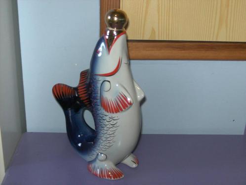 Mooie oude likeurfles. (visvorm)., Antiek en Kunst, Curiosa en Brocante, Ophalen of Verzenden
