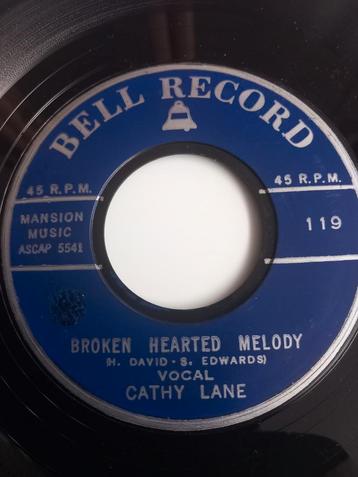 CATHY LANE. VG/+ BROKEN HEART MELODY. POPCORN 45T  disponible aux enchères