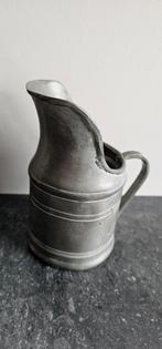 Tinnen kruikje, Ophalen