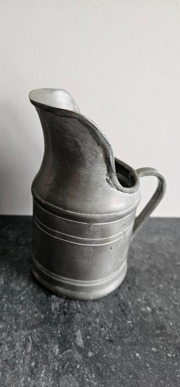 Tinnen kruikje beschikbaar voor biedingen