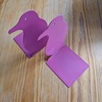 boekensteun pinguïn, Ophalen