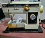Naaimachine Anker, Ophalen