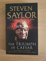Steven Saylor - The triump of Caesar, Boeken, Ophalen, Zo goed als nieuw