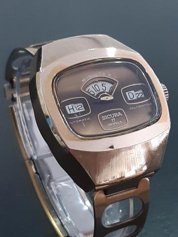 Sicura automatic jumping hour 1960/70  