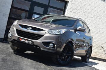 Hyundai IX35 1.6i Xenon / Navi / Cruise / PDC / Garantie, Auto's, Monovolume, 4 cilinders, Bruin, 400 kg