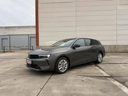 Te koop: Opel Astra Sports Tourer – 2024 – Schadevrij, Auto's, Opel, Bedrijf, Astra, ABS, Adaptieve lichten, Adaptive Cruise Control