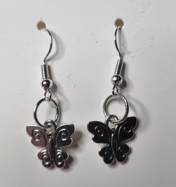 Oorbellen met vlinders beschikbaar voor biedingen