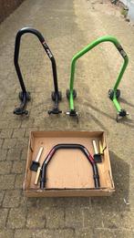 Paddock voor- en achterwiel, Motoren, Ophalen