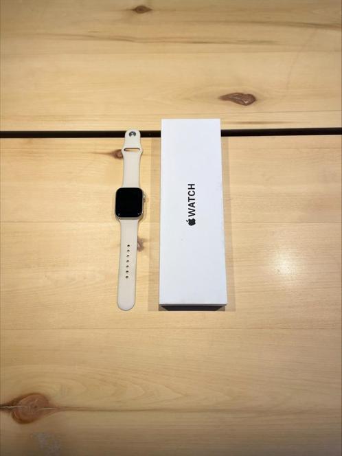 APPLE Watch SE GPS 40mm Starlight Sport Band S/M Smartwatch, Handtassen en Accessoires, Smartwatches, Nieuw, iOS, Roze, Afstand