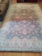 Tapis en laine grand, Ophalen