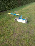 Hand Nivelleer machine grondwerken, Ophalen