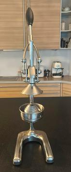 Professionele handmatige fruitpers, Ophalen