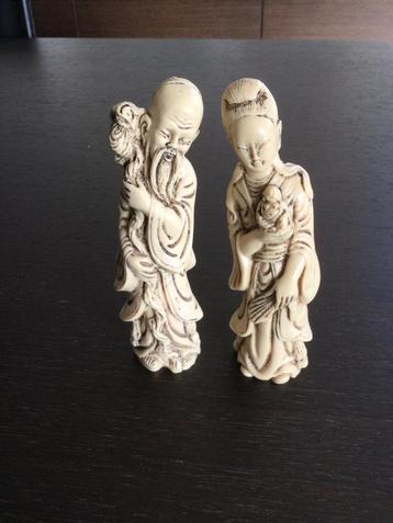 Couple chinois en résine sculptée 